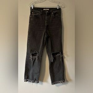 Levi’s Ribcage straight jeans 28 black distressed knee raw hem high rise.